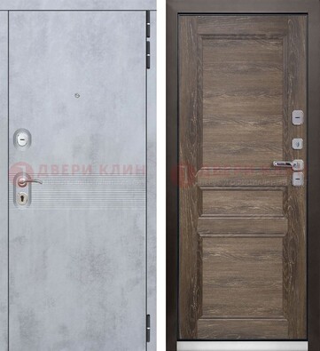 Серая металлическая дверь с МДФ коричневого цвета ДМ-304 в Санкт-Петербурге