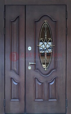 Темная металлическая дверь Винорит со стеклом и ковкой ДСК-239 в Егорьевске