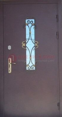 Металлическая дверь со стеклом и ковкой ДСК-77 в панельный дом в Егорьевске
