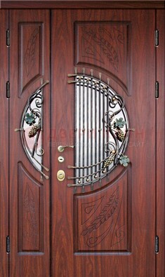 Железная дверь с виноритом и стеклом с ковкой ДВТ-170 в Кирове